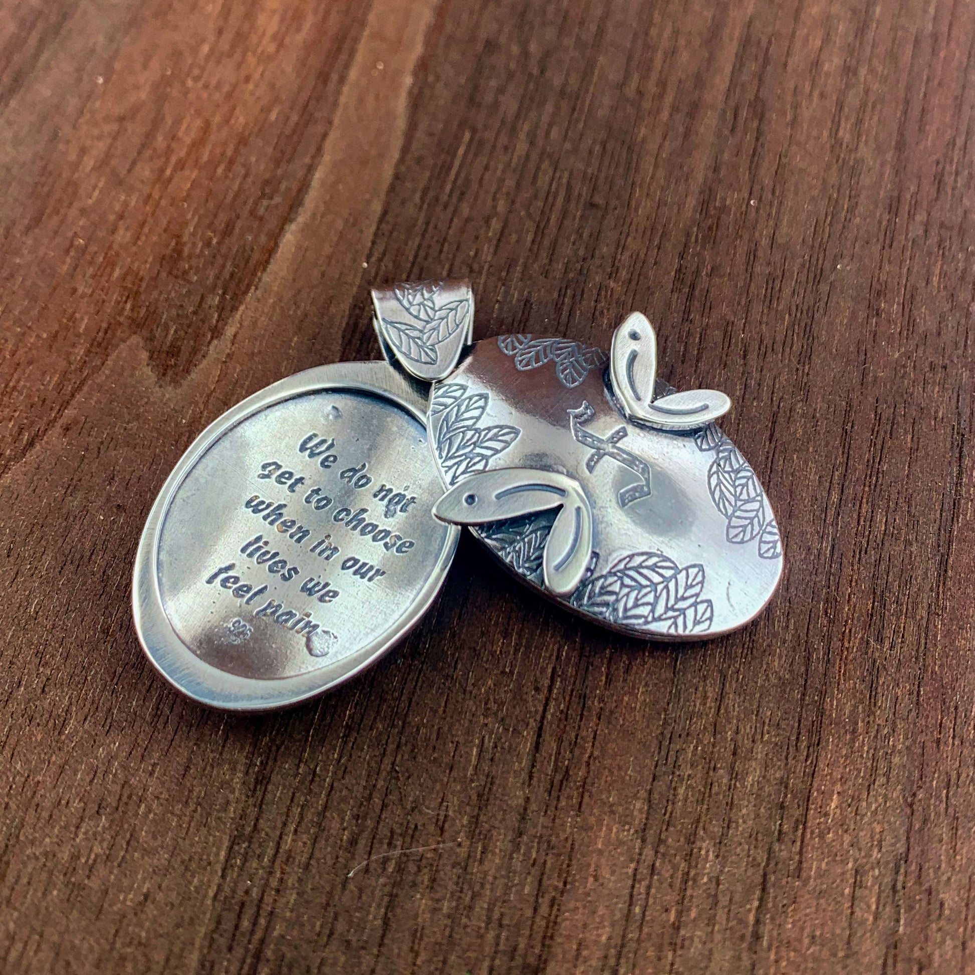Fairchild custom silver locket and quote